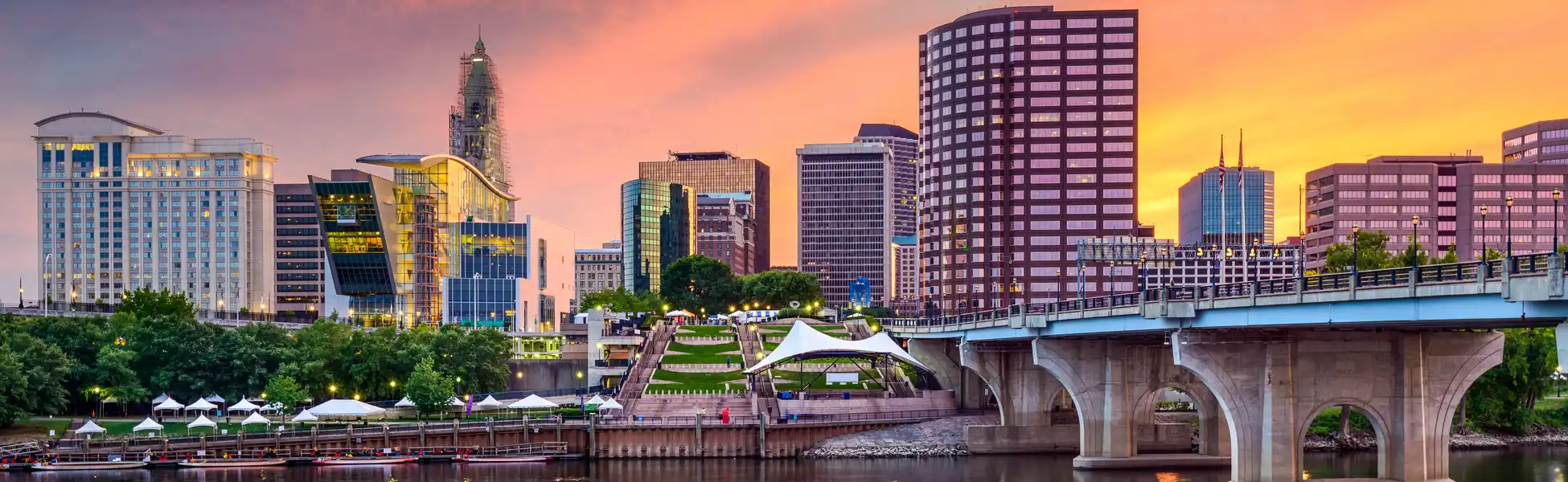 Neon color image of a band playing and people singing along