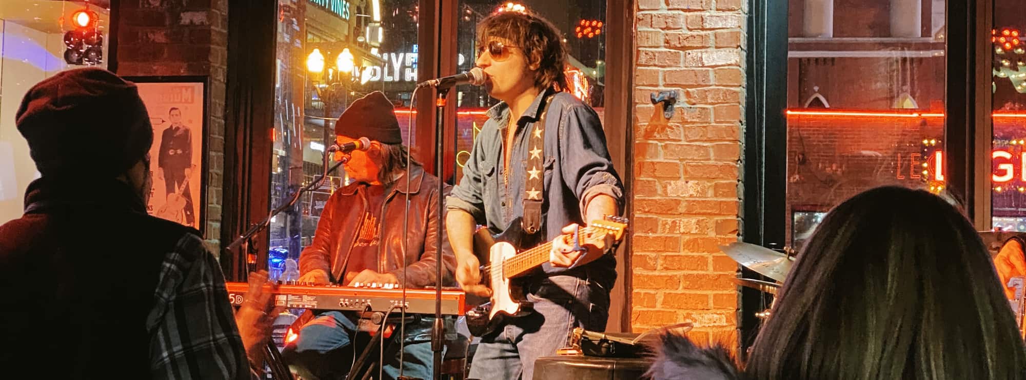 bar singer on guitar in Hartford